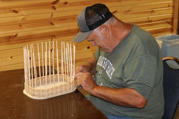A picture containing person, person, indoor, cage

Description automatically generated